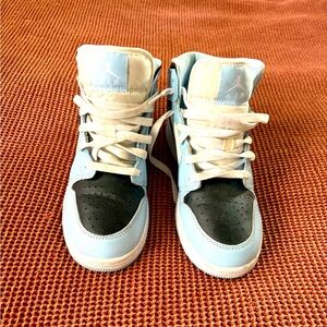 Nike Air Jordan’s blue/black, youth size 6. Worn only handful of times.